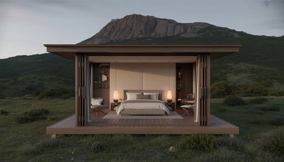 Interior do Chalé Supreme Cristal com lareira e vista para a natureza em Monte Verde