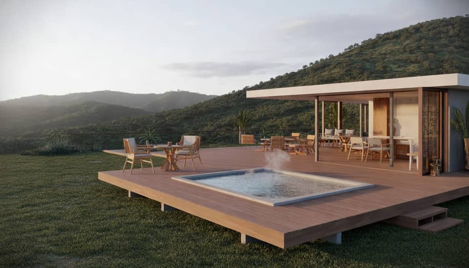 Deck Lounge Poema de 400m² com bangalôs e jacuzzi aquecida com vista para a Serra da Mantiqueira na Carícia do Vento Pousada Boutique em Monte Verde